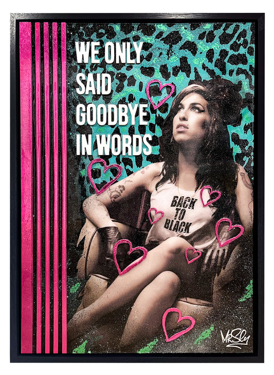 Amy Winehouse artwork inspired by 'Back to Black,' featuring custom 3D elements, a hand-painted love heart, spray-painted stencils, and foil accents in pink and teal. Amy is shown sitting on a sofa in a classy, cool pop art style with a luxurious 3D deluxe finish.
